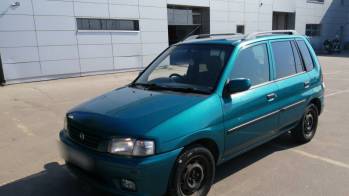 Mazda Demio I (DW) 1.5 MT (75 л.с.) [1997]