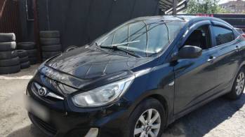 Hyundai Solaris I 1.6 MT (123 л.с.) [2012]