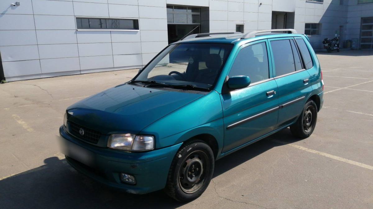 Mazda Demio I (DW) 1.5 MT (75 л.с.) [1997] 1997