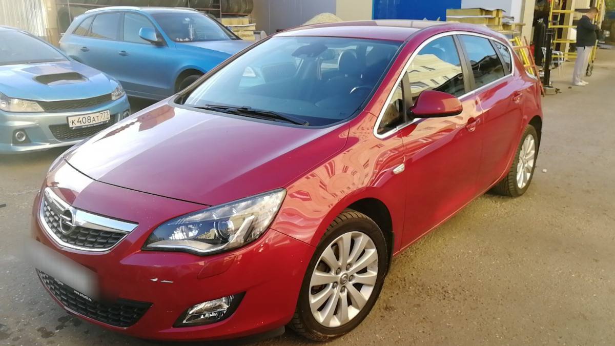 Opel Astra J 1.6 AT (180 л.с.) [2011]